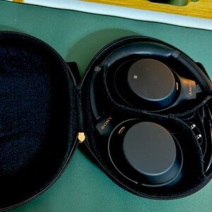 Sony Headphones in black color. Has all included items in photo.